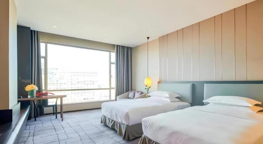 Maison New Century Hotel Dongguan Dongguan  Zewnętrze zdjęcie